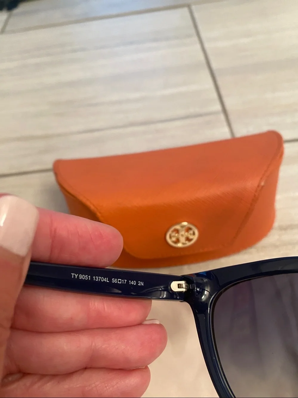 Tory Burch Navy sunglasses with cases.